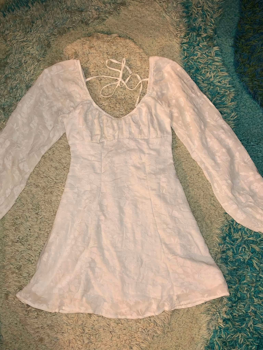 White Long-Sleeve Mini Dress with Scoop Neckline and Subtle Texture
